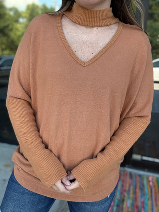 woman wearing brown long sleeve sweater outside- ava wray boutique