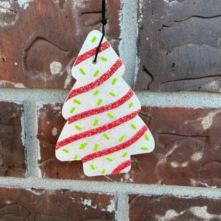 Peppermint swirl Christmas tree car freshie with red glitter stripes and green sprinkles from Ava Wray Boutique.